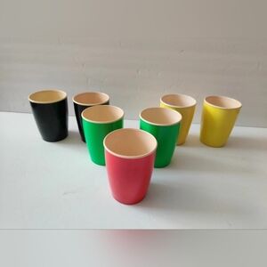 7 Plastic Cups Germany 1 Red 2 Green 2 Black 2 Yellow